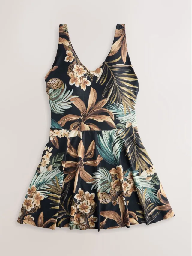 Next Dames - Vormgevende zwemjurk met rokje en buikcontrole - Zwart Black Palm Print