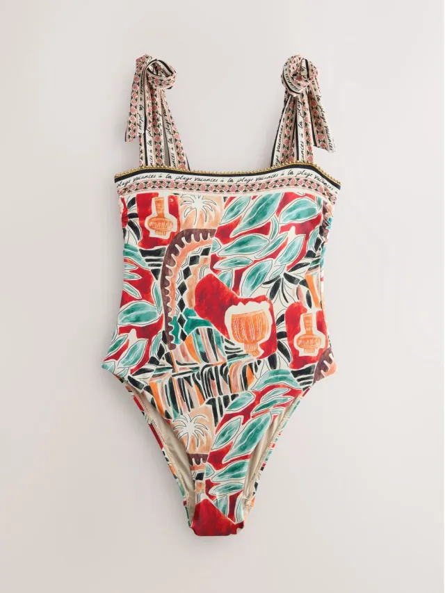 Next Dames - Buikcorrigerend badpak met randen - Rood Rust Red Abstract