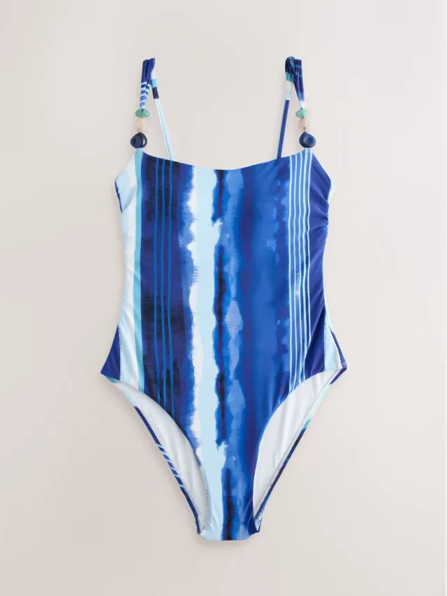 Next Dames - Buikcorrigerend badpak met kralen op de bandjes - Blauw Blue Tiedye Stripe