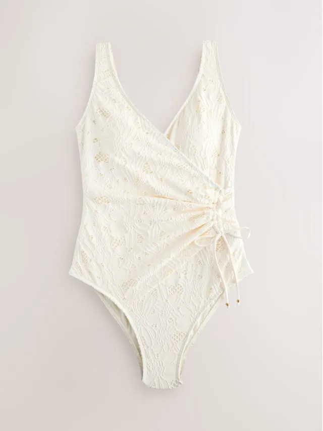 Next Dames - Vormgevend en buikcorrigerend badpak met gerimpelde zijkant - Crème Cream Broderie