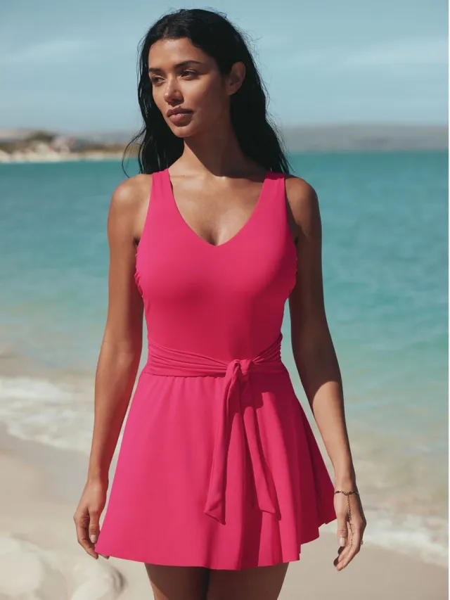 Next Dames - Vormgevende zwemjurk met rokje en buikcontrole - Roze Pink